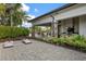 Community patio with BBQ grills and seating at 5592 Semolino St, Nokomis, FL 34275