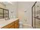 Well-appointed bathroom with shower, vanity, and toilet at 5592 Semolino St, Nokomis, FL 34275