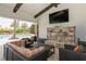 Relaxing clubhouse with fireplace and pool view at 5592 Semolino St, Nokomis, FL 34275