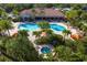 Resort-style pool and spa with ample lounge space at 5592 Semolino St, Nokomis, FL 34275
