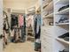 Large walk-in closet with ample shelving and hanging space at 5592 Semolino St, Nokomis, FL 34275