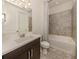 Bathroom with tub, shower, and dark vanity at 5733 Semolino St, Nokomis, FL 34275