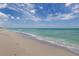 Expansive beach with calm ocean waves at 5733 Semolino St, Nokomis, FL 34275