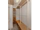 Large closet with wood shelves and hanging rods at 5733 Semolino St, Nokomis, FL 34275