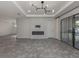 Living room features a fireplace and outdoor access at 5733 Semolino St, Nokomis, FL 34275