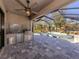 Outdoor kitchen and screened pool area at 5733 Semolino St, Nokomis, FL 34275