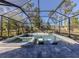 Screened pool and spa with lounge chairs at 5733 Semolino St, Nokomis, FL 34275