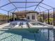 Relaxing pool and spa with screened enclosure at 5733 Semolino St, Nokomis, FL 34275