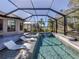 Resort-style pool and spa with lake view at 5733 Semolino St, Nokomis, FL 34275