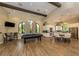 Community recreation room with pool table and kitchen at 5733 Semolino St, Nokomis, FL 34275