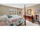 Bright bedroom with a comfortable bed and plenty of storage at 649 Tamiami S Trl # 107, Venice, FL 34285