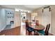 Dining area with barn door leading to kitchen at 649 Tamiami S Trl # 107, Venice, FL 34285