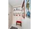 Inviting entryway with built-in shelves and seating at 649 Tamiami S Trl # 107, Venice, FL 34285