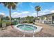 Relaxing community hot tub with surrounding patio at 652 Linden Dr, Englewood, FL 34223