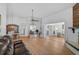 Open living and dining area with hardwood floors and ample natural light at 652 Linden Dr, Englewood, FL 34223