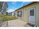 Private patio with access from the back of the house at 652 Linden Dr, Englewood, FL 34223