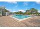 Refreshing community pool with surrounding patio at 652 Linden Dr, Englewood, FL 34223