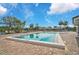Inviting community swimming pool with ample deck space at 652 Linden Dr, Englewood, FL 34223