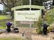 Wildflower Village 55+ deed restricted community sign at 6796 Gasparilla Pines Blvd # 13, Englewood, FL 34224