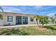 Neat and clean exterior of the property at 6796 Gasparilla Pines Blvd # 13, Englewood, FL 34224