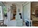 Bright Florida room with comfy seating and access to outdoor patio at 6796 Gasparilla Pines Blvd # 13, Englewood, FL 34224