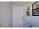 Exterior view of white front door with sidelight at 6796 Gasparilla Pines Blvd # 13, Englewood, FL 34224