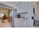 Eat-in kitchen with stainless steel appliances and ample cabinet space at 6796 Gasparilla Pines Blvd # 13, Englewood, FL 34224