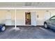 Open storage unit with bike and various items at 6796 Gasparilla Pines Blvd # 13, Englewood, FL 34224