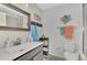 Clean bathroom with toilet, sink, and shower at 738 Sorrento Inlt # 738, Nokomis, FL 34275