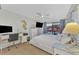 Bedroom with queen bed, desk, and adjacent closet at 738 Sorrento Inlt # 738, Nokomis, FL 34275