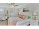 Spacious bedroom with king bed, built-in dresser, and en-suite bathroom at 738 Sorrento Inlt # 738, Nokomis, FL 34275