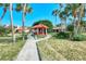 Relaxing gazebo with seating in a lush community landscape at 738 Sorrento Inlt # 738, Nokomis, FL 34275