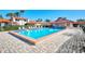 Inviting community pool area with a covered patio at 738 Sorrento Inlt # 738, Nokomis, FL 34275