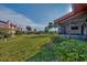View of building and lawn at 738 Sorrento Inlt # 738, Nokomis, FL 34275