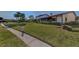Walkway and lush lawn at 738 Sorrento Inlt # 738, Nokomis, FL 34275