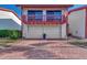 Inviting exterior with double garage and brick paver driveway at 738 Sorrento Inlt # 738, Nokomis, FL 34275
