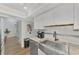 Kitchen boasts granite counters and farmhouse sink at 738 Sorrento Inlt # 738, Nokomis, FL 34275