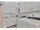 Bright laundry room with washer and dryer at 738 Sorrento Inlt # 738, Nokomis, FL 34275