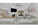 Relaxing living room, featuring a sectional sofa and fireplace at 738 Sorrento Inlt # 738, Nokomis, FL 34275