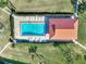 Overhead view of community pool and adjacent building at 738 Sorrento Inlt # 738, Nokomis, FL 34275