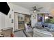Relaxing screened porch with seating area at 738 Sorrento Inlt # 738, Nokomis, FL 34275