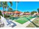 Enjoy a game of shuffleboard in this community green space at 738 Sorrento Inlt # 738, Nokomis, FL 34275