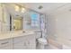 Clean bathroom with tub, shower and vanity at 817 Montrose Dr # 103, Venice, FL 34293