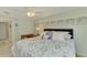Comfortable bedroom with a king-size bed and dresser at 817 Montrose Dr # 103, Venice, FL 34293