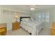 Cozy bedroom with a double bed, nightstand and window shutters at 817 Montrose Dr # 103, Venice, FL 34293