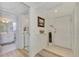 Bright condo entry with access to laundry and bathroom at 817 Montrose Dr # 103, Venice, FL 34293
