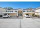 Condo building with covered parking and landscaping at 817 Montrose Dr # 103, Venice, FL 34293