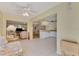 Bright and airy condo features an open floor plan with kitchen and living room at 817 Montrose Dr # 103, Venice, FL 34293