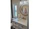 Bathroom boasting a stylish mirror, a modern vanity, and a toilet at 874 Baveno Dr, Venice, FL 34285