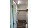 Walk in closet with adjustable wire shelving providing ample storage space at 874 Baveno Dr, Venice, FL 34285